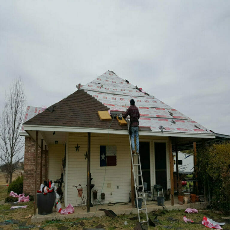 New roof being installed after storm damage in Log Cabin TX