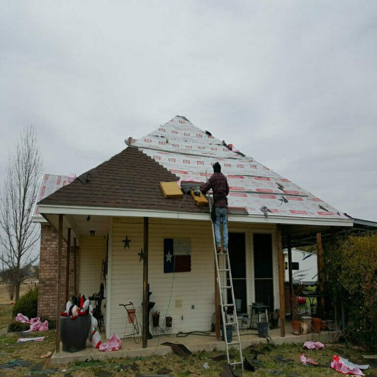 New roof being installed after storm damage in Payne Springs TX